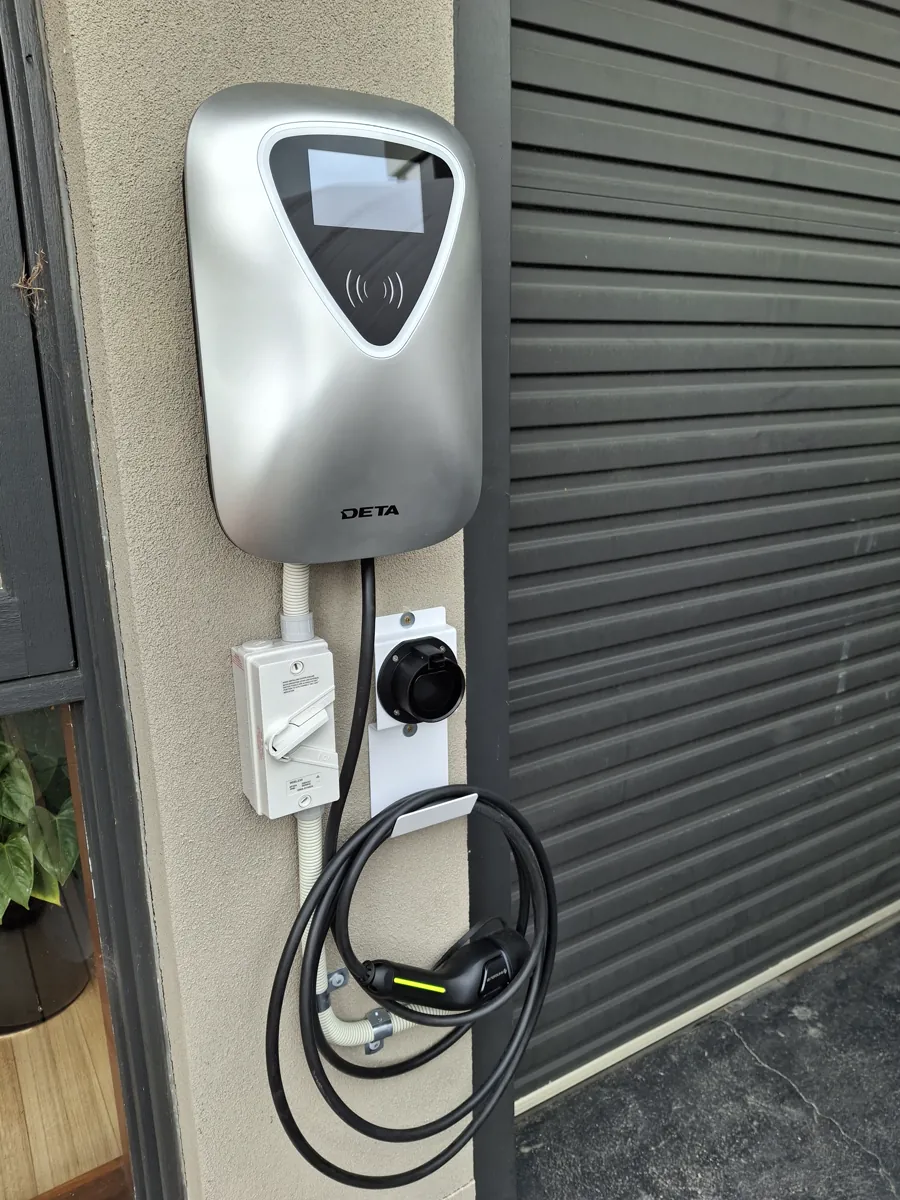 Wall-mounted EV charger installation